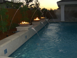 outdoor fireplaces by pool